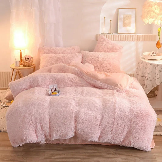 Bed standing in a bed room with Blush Pink Bedding on it