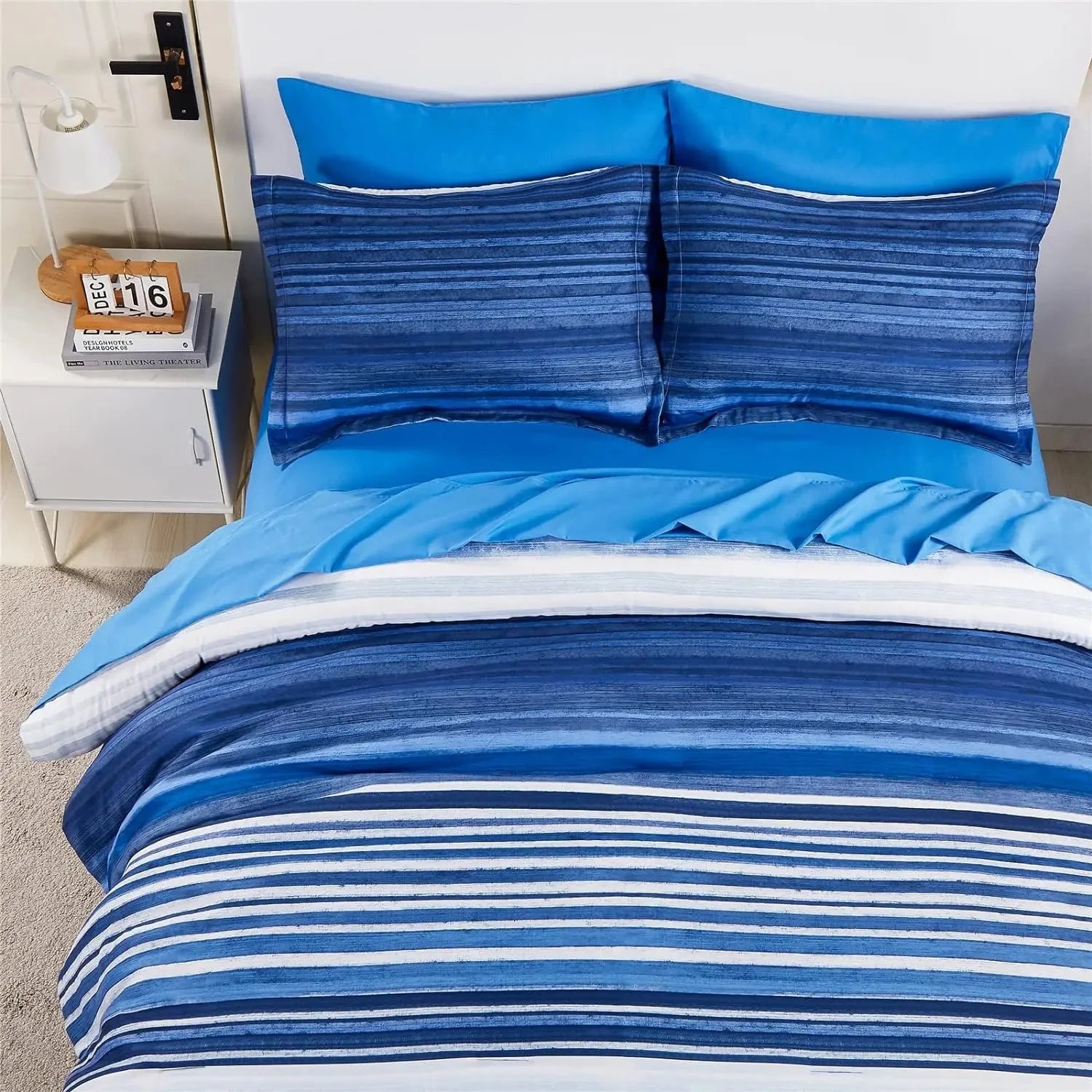 Pillow covers and duvet fitted with a Blue Striped Bedding set