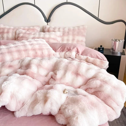 blanket and pillows fitted with a Pink Velvet Bedding set