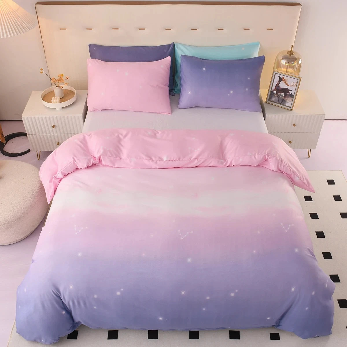 Bed fitted with a Pink and Purple Bedding set