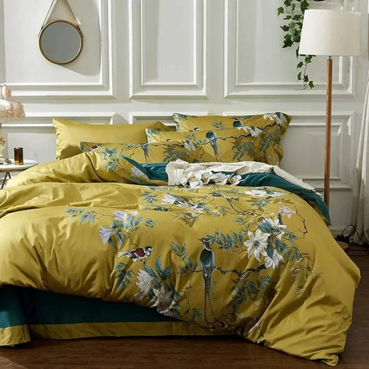Bed standing in a bedroom in front of a white wall fitted with a Yellow and Green Floral Bedding set